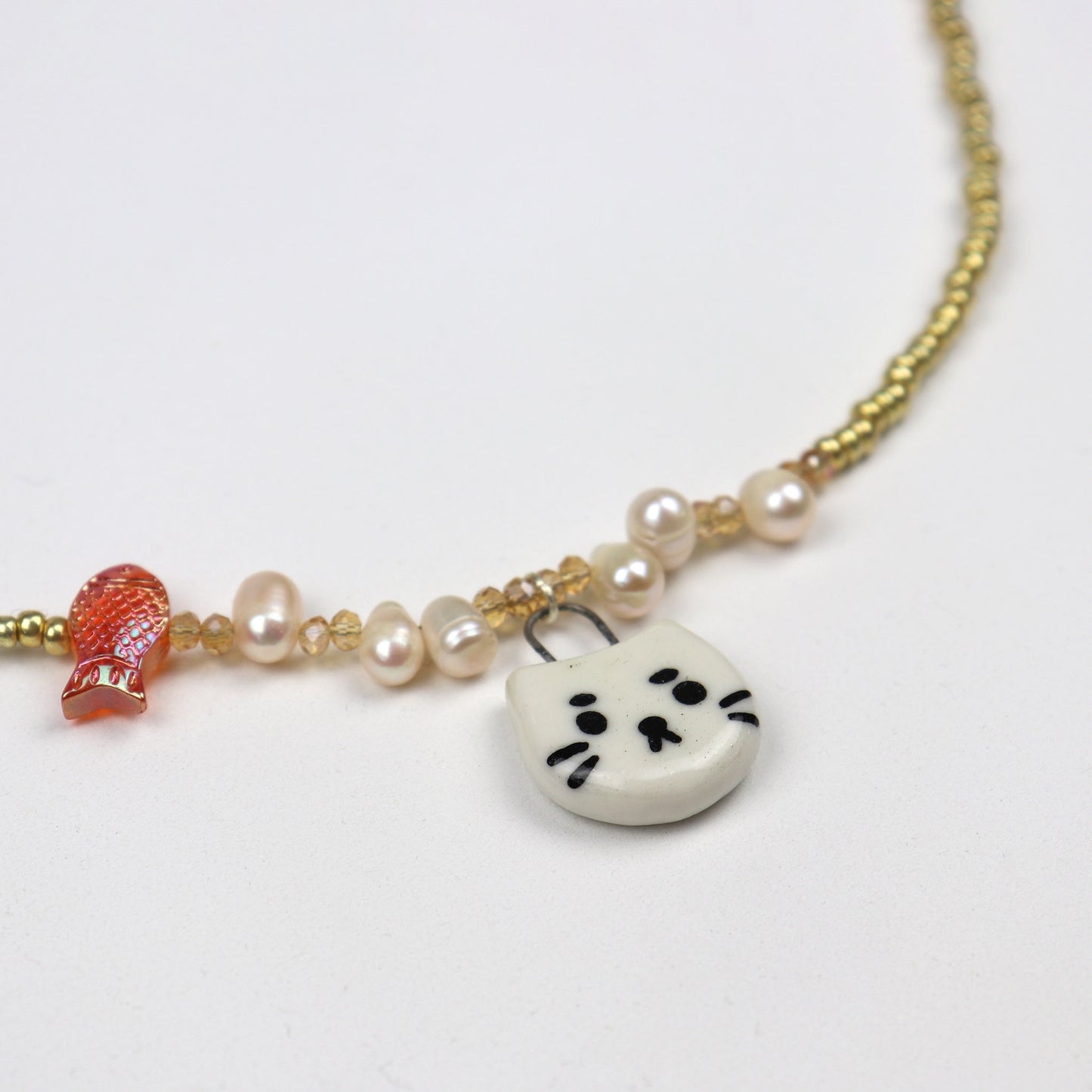 Handmade Beaded Necklace - Gold with White Cat Pendant