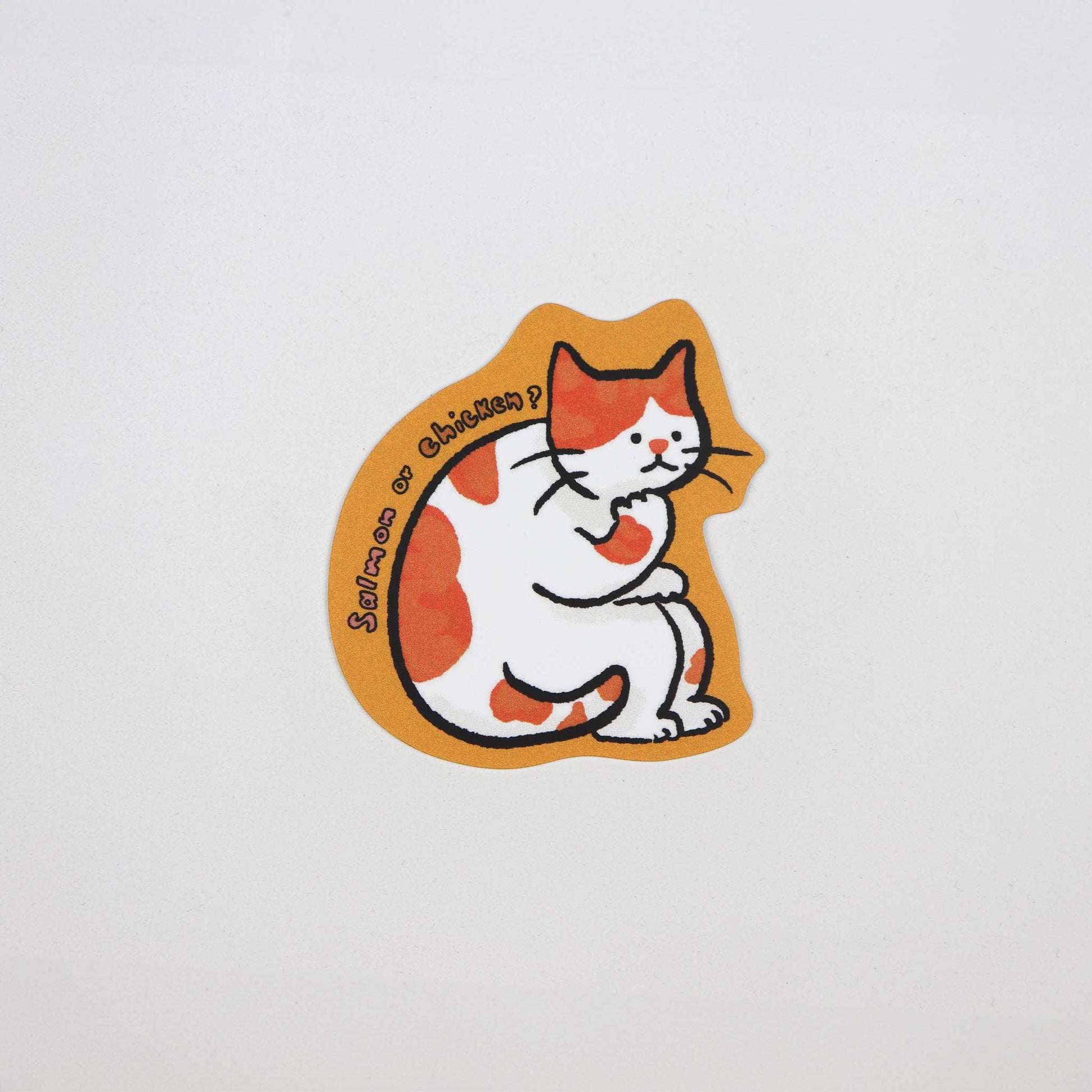 Sticker of cartoon ginger and white cat sitting and contemplating