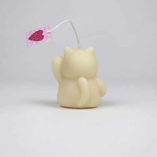 Back of white handmade lucky cat candle with cotton wick, soy-based and scented, made in Brisbane