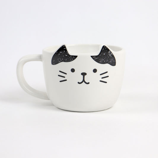 ceramic black and white cat cup with dot eyes