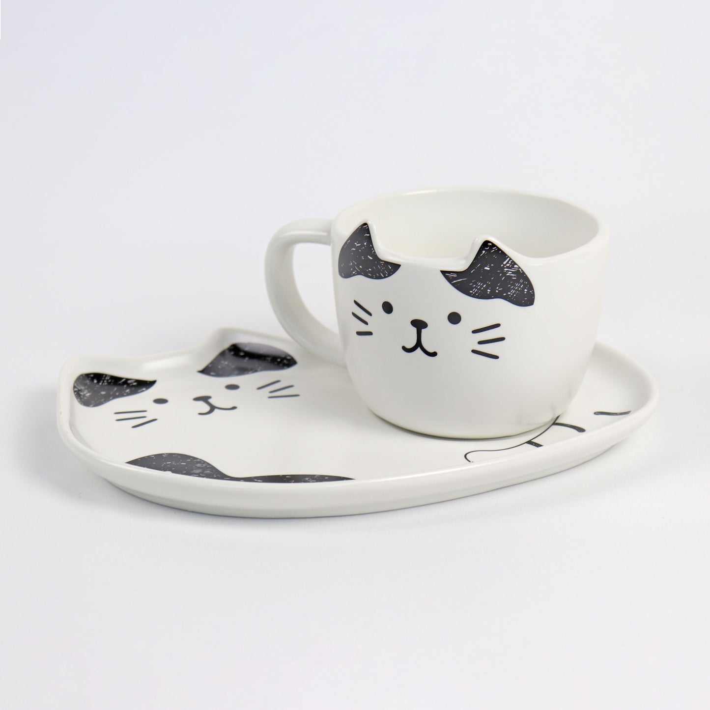 black and white cat cup and saucer set