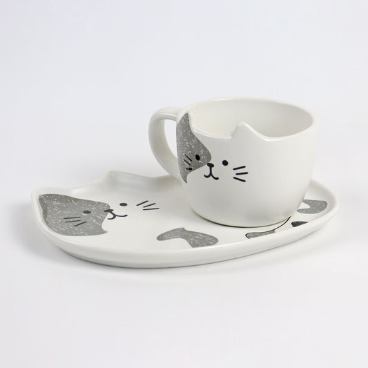 grey and white cat cup and saucer set