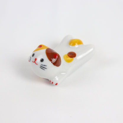 yellow and brown cute ceramic cat chopstick rest