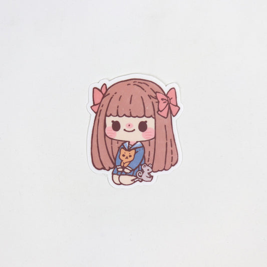 Matte waterproof sticker of Tohru Honda from Fruits Basket as a cat in a school uniform. Die cut, approx. 5cm x 7cm.